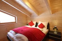 Posteľ alebo postele v izbe v ubytovaní Heidi Chalets Falkert Heidialm - Chalet Almsommer