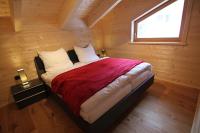 Posteľ alebo postele v izbe v ubytovaní Heidi Chalets Falkert Heidialm - Chalet Almsommer
