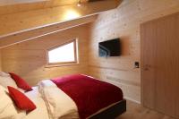 Televízia a/alebo spoločenská miestnosť v ubytovaní Heidi Chalets Falkert Heidialm - Chalet Almsommer