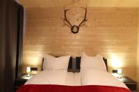 Posteľ alebo postele v izbe v ubytovaní Heidi Chalets Falkert Heidialm - Chalet Almsommer