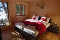 Posteľ alebo postele v izbe v ubytovaní Heidi Chalets Falkert Heidialm - Chalet Almsommer