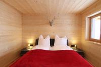 Posteľ alebo postele v izbe v ubytovaní Heidi Chalets Falkert Heidialm - Chalet Almsommer