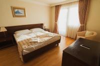 Postel nebo postele na pokoji v ubytování Family Hotel Pagus - All Inclusive