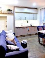 Kuchyňa alebo kuchynka v ubytovaní Apartamenty Sjesta Centrum