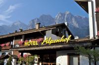 a hotel albuquerque with mountains in the background at Alpenhof Grainau in Grainau