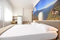 Posteľ alebo postele v izbe v ubytovaní Residence Franca B&B
