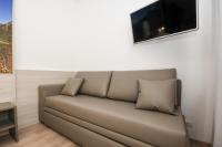 Televízia a/alebo spoločenská miestnosť v ubytovaní Residence Franca B&B