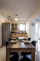 A kitchen or kitchenette at Holy Paraskevi Apartment
