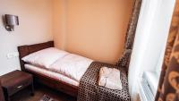 Postel nebo postele na pokoji v ubytování Star Hotel