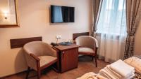 TV a/nebo společenská místnost v ubytování Star Hotel