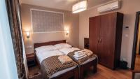 Postel nebo postele na pokoji v ubytování Star Hotel