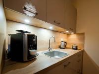 Kuchyňa alebo kuchynka v ubytovaní Apartament Muszelka