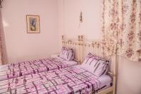 Postel nebo postele na pokoji v ubytování Plagia's Sunset Apartments