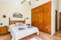Postel nebo postele na pokoji v ubytování Villa Marcolis Cel