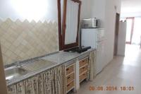 A kitchen or kitchenette at SENAFER Funtana Meiga
