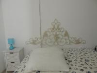 A bed or beds in a room at SENAFER Funtana Meiga