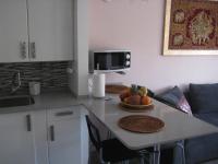 Kuchyň nebo kuchyňský kout v ubytování Malibu apartamento con campo de tennis y piscina con solarium