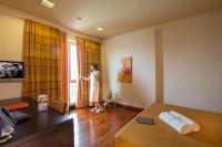 A television and/or entertainment centre at Victoria Terme Hotel