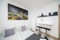 6 Cities Roomsにあるテレビまたはエンターテインメントセンター