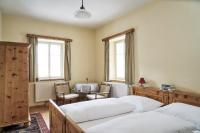 Łóżko lub łóżka w pokoju w obiekcie Hotel Post Mauterndorf OG