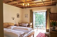 Łóżko lub łóżka w pokoju w obiekcie Hotel Post Mauterndorf OG