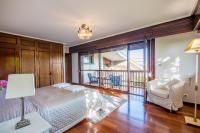 Postel nebo postele na pokoji v ubytování Azkorri Beach House