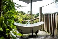 Freshwaterfarm Cottages - Muriwaiにある庭