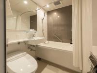 a bathroom with a toilet and a sink and a bath tub at Tokyu Stay Kyoto Sanjo-Karasuma in Kyoto