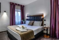 Posteľ alebo postele v izbe v ubytovaní Navona Colors Hotel