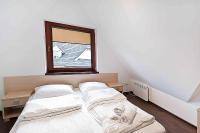 Posteľ alebo postele v izbe v ubytovaní Apartamenty Sun & Snow Kościelisko Residence
