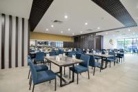 Restaurace v ubytování Magnolia Hotel