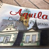 a book with a picture of a building at Hotel Adler in Rudolstadt