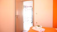 Posteľ alebo postele v izbe v ubytovaní Apartmani Mirela & Feri
