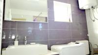 Kúpeľňa v ubytovaní Apartmani Mirela & Feri