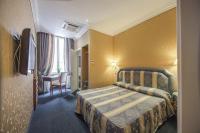 Posteľ alebo postele v izbe v ubytovaní 939 Hotel