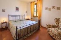 Posteľ alebo postele v izbe v ubytovaní Agriturismo Fattoria Santo Stefano