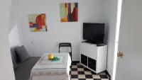 TV a/nebo společenská místnost v ubytování Apartamento centro histórico Arcos