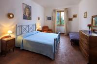 Posteľ alebo postele v izbe v ubytovaní Agriturismo Fattoria Santo Stefano