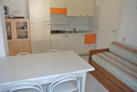 A kitchen or kitchenette at Condominio BILLA
