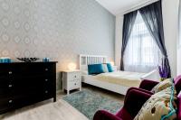 Posteľ alebo postele v izbe v ubytovaní Downtown Residences