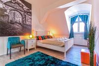 Posteľ alebo postele v izbe v ubytovaní Downtown Residences