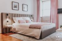 Postel nebo postele na pokoji v ubytování Calacatta Housing