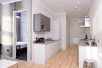 Kuchyň nebo kuchyňský kout v ubytování Destiny Scotland Charlotte Square Apartments