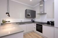 Kuchyň nebo kuchyňský kout v ubytování Destiny Scotland Charlotte Square Apartments
