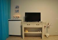 Televízia a/alebo spoločenská miestnosť v ubytovaní Dream Apartment