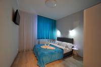 Posteľ alebo postele v izbe v ubytovaní Dream Apartment