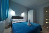 Posteľ alebo postele v izbe v ubytovaní Dream Apartment
