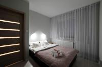 Posteľ alebo postele v izbe v ubytovaní Dream Apartment