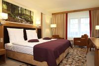 Posteľ alebo postele v izbe v ubytovaní Hotel Mercure Krynica Zdrój Resort&Spa
