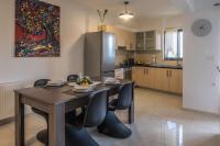 A kitchen or kitchenette at Holy Paraskevi Apartment